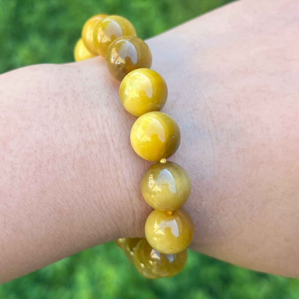 12mm stretchable high quality flashy golden tiger eye bracelet